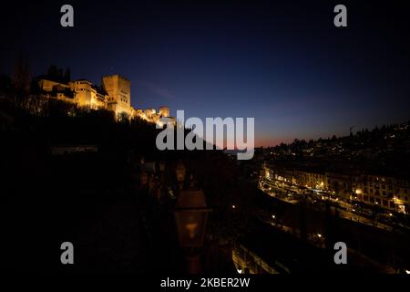 Sunset view of the Alhambra monument and Albaicin neighborhood in Granada on January 9, 2020 in Granada, Spain. (Photo by Fermin Rodriguez/NurPhoto) Stock Photo