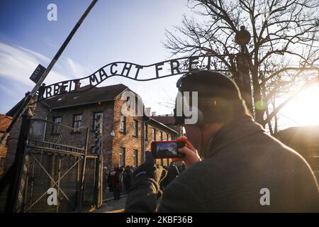 Arbeit Macht Frei entrance gate is seen while European Jewish Association (EJA) delegation visits Auschwitz concentration camp on January 21, 2020 in Oswiecim, Poland. Parliamentarians and education ministers from across Europe have gathered during 'EJA Delegation to Auschwitz 2020' event to mark the upcoming 75th anniversary of the liberation of the former Nazi German concentration camp. (Photo by Beata Zawrzel/NurPhoto) Stock Photo