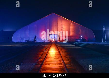 The Gate of Death building is hide inside a huge tent for the 75th anniversary of the liberation of KL Auschwitz-Birkenau concentration and extermination camp. On January 27, 2020 in Brzezinka near Oswiecim, Poland. (Photo by Beata Zawrzel/NurPhoto) Stock Photo