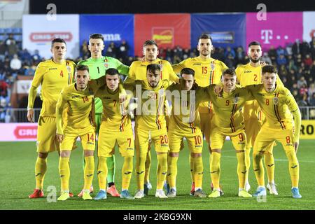 Romania's first eleven poses for the official photo before the game. The top Row from left to right: Alexandru Pascanu, Daniel Vlad, Andrei Ratiu, Andrei Chindris, Radu Boboc; The bottom row, from left to right: Razvan Oaida, Valentin Mihaila, Andrei Ciobanu, Olimpiu Morutan, George Ganea, Dennis Man of UEFA U21 championship between Romania U21 v Finland U21, in Voluntari, Romania, on November 14, 2019. (Photo by Alex Nicodim/NurPhoto) Stock Photo