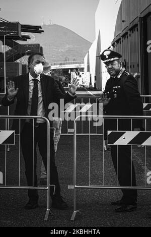 (EDITOR'S NOTE: Image was converted to black and white) The Quaestor of Padua Dr. Paolo Fassari visit Schiavonia Hospital in the province of Padua, Italy, on 22 February 2020 after the first victim of coronavirus in Italy. The coronavirus (COVID-19) arrives in the Veneto recording 7 cases of alleged contagion. The infected were initially moved to Schiavonia hospital, now in quarantine they have been moved to Padua hospital. The infection is spread by the city of Vo 'Euganeo. In the picture the exterior of Schiavonia hospitals manned by the carabinieri and isolated in quarantine,Schiavonia, Ita Stock Photo
