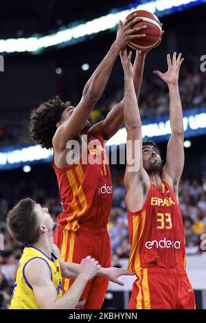 Sebastian Saiz and Javier Beiran of Spain in action against Lucas Tohotan of Romania during the FIBA EuroBasket Qualifiers Group Phase Group A match between Romania and Spain, in Cluj Napoca, Romania, on February 20, 2020. (Photo by Alex Nicodim/NurPhoto) Stock Photo