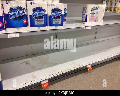 Empty shelves of toilet paper seen in a grocery store as Canadians followed the instructions of Canada's Health Minister Patty Hajdu to stock up on supplies to prepare in case of a novel coronavirus (COVID-19) outbreak as seen in Toronto, Ontario Canada on March 04, 2020. Following Canada's health minister encouraging Canadians to stockpile supplies in case of a coronavirus outbreak, stores across the country are faced with empty shelves as face masks, disinfectant and toilet paper shortages have been reported. (Photo by Creative Touch Imaging Ltd./NurPhoto) Stock Photo