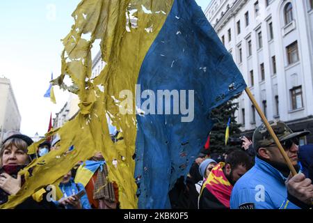 I veterani ucraini del conflitto militare nelle regioni orientali dell'Ucraina, i volontari e la gente comune prendono parte alla "marcia dei patrioti" nel centro di Kyiv, Ucraina, 14 marzo 2020, in occasione della Giornata dei volontari. (Foto di Maxym Marusenko/NurPhoto) Foto Stock