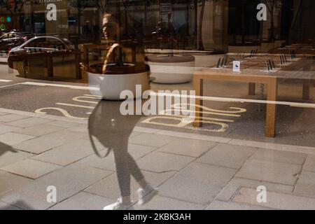 The temporarily closed Apple flagship store stands empty on a quiet Regent Street in London, England, on March 16, 2020. Apple announced over the weekend the temporary closure of all its retail stores worldwide, other than those in China, over coronavirus concerns. Around the UK, as elsewhere in the world, covid-19 coronavirus fears continue to escalate as the numbers of cases and deaths continues to rise. British Prime Minister Boris Johnson meanwhile remains under pressure over the government's so-called herd immunity strategy, which bucks the closures-and-lockdowns approach adopted by count Stock Photo