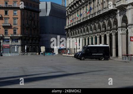 A police check in Piazza Duomo in Milan, Italy during the lockdown due to Coronavirus emergency, on April 14, 2020. (Photo by Mairo Cinquetti/NurPhoto) Stock Photo