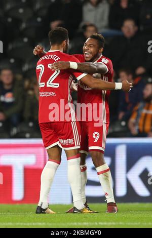 Britt Assombalonga of Middlesbrough celebrates with Cyrus Christie after scoring their second goal during the Sky Bet Championship match between Hull City and Middlesbrough at the KC Stadium, Kingston upon Hull, UK on 31st October 2017. (Photo by Mark Fletcher/MI News/NurPhoto) Stock Photo