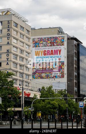 A billboard of well know organisation Great Orchestra of Christmas Charity is displayed during coronavirus pandemic in the centre of Warsaw, Poland on May 7, 2020. (Photo by Dominika Zarzycka/NurPhoto) Stock Photo