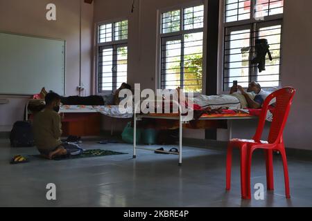 A muslim man offer prayers before going for COVID-19 (Coronavirus) test at a Quarantine center in district Baramulla of Jammu and Kashmir, India on 21 June 2020. The sampling for air travellers is done at the airport and at the Quarantine centers for those who travel by road. (Photo by Nasir Kachroo/NurPhoto) Stock Photo