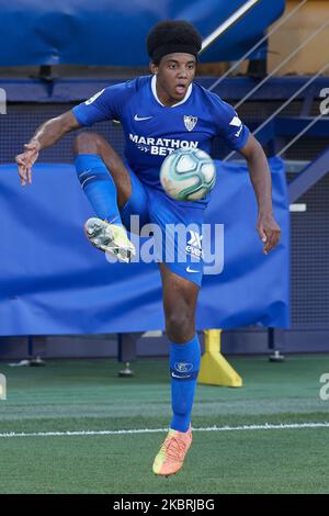 Jules Kounde of Sevilla controls the ball during the Liga match between Villarreal CF and Sevilla FC at Estadio de la Ceramica on June 22, 2020 in Villareal, Spain. (Photo by Jose Breton/Pics Action/NurPhoto) Stock Photo