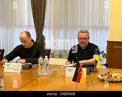 Kiew, Ukraine. 04th Nov, 2022. Ukraine's Prosecutor General, Andriy Kostin (r), sits next to Yuri Bielousov, head of the Department for Combating Crimes in Armed Conflict, during a meeting with German Justice Minister M. Bushman (FDP) at his official residence. Many Cabinet members have traveled to Ukraine since the war began on Feb. 24 to show the flag and promise help. Justice Minister Bushman is not asked for weapons. He makes other offers that go beyond the war. (to dpa 'Justice Minister Bushman Offers Help in Kiev for EU Accession') Credit: Ann Beatrice Clasmann/dpa/Alamy Live News Stock Photo