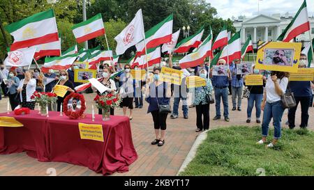 Iraniani americani, sostenitori dell'opposizione Consiglio Nazionale di resistenza dell'Iran, che tiene un rally di fronte alla Casa Bianca, il 12 settembre 2020, per protestare contro l'esecuzione del giovane campione iraniano di lotta, Navid Afkari, Che è stato impiccato per aver partecipato a proteste pacifiche nella città meridionale di Kazerun nel dicembre 2017. (Foto di Siavosh Hosseini/NurPhoto) Foto Stock