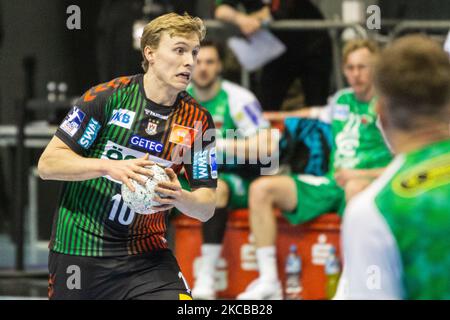 Gisli Thorgeir Kristjansson di SC Magdeburg controlla la palla durante la partita LIQUI MOLY Handball-Bundesliga tra SC Magdeburg e Fuechse Berlin al GETEC-Arena il 21 marzo 2021 a Magdeburgo, Germania. (Foto di Peter Niedung/NurPhoto) Foto Stock