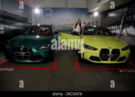 I modelli si pongono tra le vetture All New BMW M3 e M4 Competition dopo un lancio virtuale a Giacarta, Indonesia, il 30 giugno 2021. BMW Indonesia ha lanciato le due vetture con tre nuovi colori, un motore 510hp/650nm ad alte prestazioni, Un design espressivo, una trasmissione BMW M Steptronic a otto velocità con Drivelogic e una serie di tecnologie innovative sviluppate da BMW M che saranno offerte per la nuova BMW M3 Competition al prezzo di 2.059 miliardi di IDR fuori strada, Mentre la nuova BMW M4 Competition Coupé sarà offerta ad un prezzo di 2,119 miliardi di IDR fuori strada. (Foto di Dasril Foto Stock