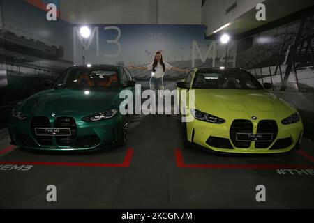 I modelli si pongono tra le vetture All New BMW M3 e M4 Competition dopo un lancio virtuale a Giacarta, Indonesia, il 30 giugno 2021. BMW Indonesia ha lanciato le due vetture con tre nuovi colori, un motore 510hp/650nm ad alte prestazioni, Un design espressivo, una trasmissione BMW M Steptronic a otto velocità con Drivelogic e una serie di tecnologie innovative sviluppate da BMW M che saranno offerte per la nuova BMW M3 Competition al prezzo di 2.059 miliardi di IDR fuori strada, Mentre la nuova BMW M4 Competition Coupé sarà offerta ad un prezzo di 2,119 miliardi di IDR fuori strada. (Foto di Dasril Foto Stock