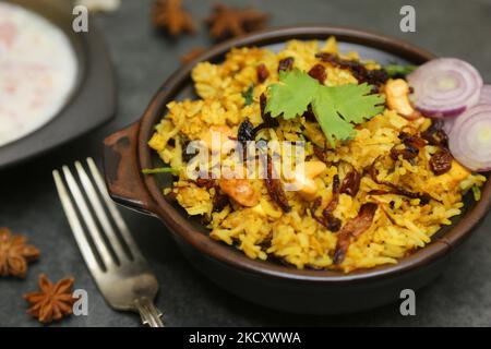 Pollo dum biryani a Toronto, Ontario, Canada, il 12 dicembre 2021. (Foto di Creative Touch Imaging Ltd./NurPhoto) Foto Stock