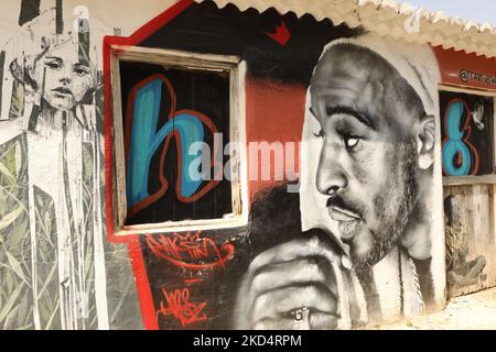 Street Art. Un murale di un uomo africano nel centro storico di Lagos, Algarve, Portogallo Foto Stock