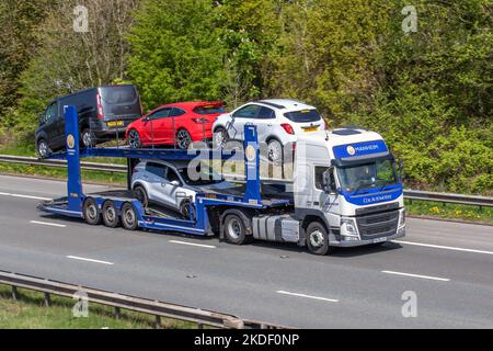 MANHEIM COX AUTOTRASPORTATORE, veicolo commerciale che viaggia sull'autostrada M6, Regno Unito Foto Stock