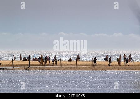 Vacanzieri sulla spiaggia di Maspolomas. Foto Stock