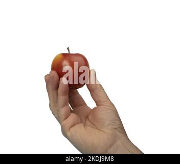 una mano maschio con una mela piccola su fondo trasparente Foto Stock