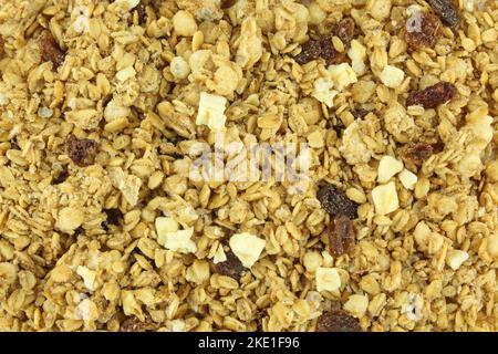 Fondo pieno di granola con uva passa. Cereali per la colazione dietetici sani Foto Stock