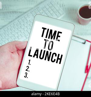 Scrittura a mano segno tempo di lancio. Word for Business startup, pianificazione e strategia, gestione, realizzazione Foto Stock