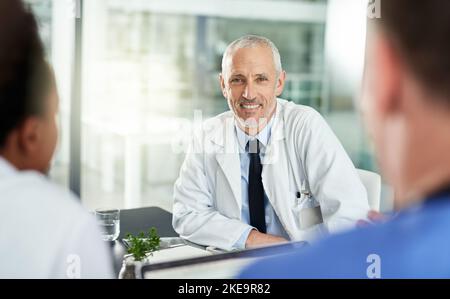 La vostra salute è della massima importanza. Medici in un ospedale. Foto Stock