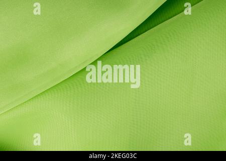 tessuto di seta verde. tessuto ondulato Foto Stock