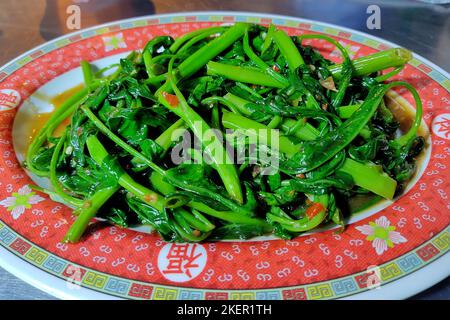 Spinaci d'acqua fritti, Thais chiamata Pad-Pak-Boong Foto Stock