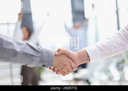 Handshake uomo d'affari per lavoro di squadra di fusione e acquisizione di imprese Foto Stock