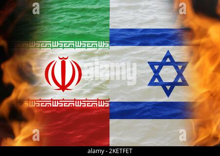 Defocalizzare Israele Iran bandiere nazionali. Notizie, reportage, background aziendale. Israele contro Iran. Battaglia di due paesi. Fuoco fiamma. Fuori fuoco Foto Stock