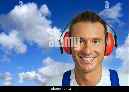 Bauarbeiter mit Gehörschutz Foto Stock