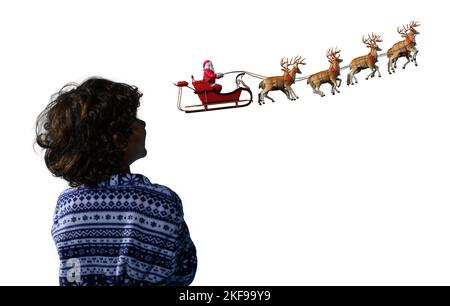 Babbo natale in una slitta pronta a consegnare i regali slitta Foto Stock