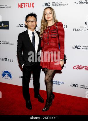 Los Angeles, CA - 17 novembre 2022: James WAN e Ingrid Bisu partecipano ai 36th Annual American Cinematheque Awards che premiano Ryan Reynolds a Beverly Foto Stock