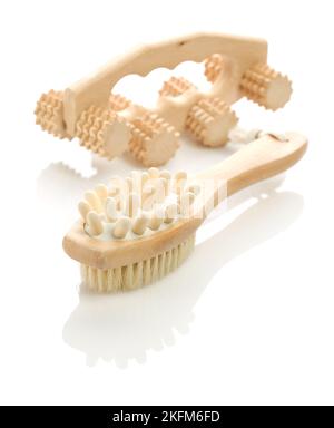 massaggiatori isolati in legno Foto Stock