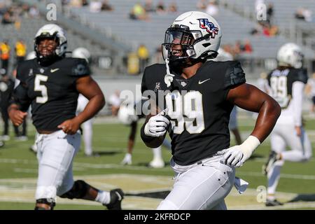 19 novembre 2022: Il ricevitore UCF Knights Wide QUAN LEE (99) si scalda durante la partita di football dell'University of Central Florida Knights e del Navy Midshipmen NCAA al FBC Mortgage Stadium di Orlando, Florida, il 19 novembre 2022. (Credit Image: © Cory Knowlton/ZUMA Press Wire) Foto Stock