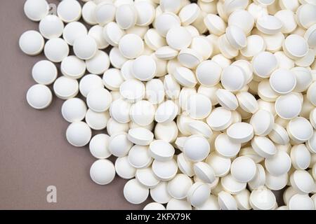 Pillole generiche bianche rotonde medicina Foto Stock