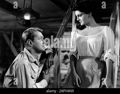 Alan Ladd, Rossana Podesta, on-set of the Film, 'Santiago', Warner Bros., 1956 Foto Stock