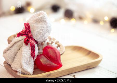 Composizione Spa con sapone a forma di cuore primo piano. Foto Stock