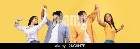 Coppie afro-americane e indiane che ballano sul giallo Foto Stock