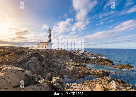 Spagna, Isole Baleari, Minorca, Faro di far de Favaritx al tramonto Foto Stock