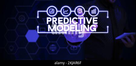 Scrittura manuale del testo Predictive Modeling (modellazione predittiva). Concetto che significa strategia di manutenzione basata sull'analisi predittiva Foto Stock