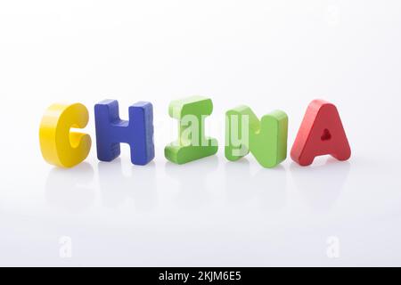 La parola Cina scritta con blocchi di lettere colorati Foto Stock