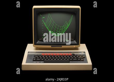 Microcomputer BBC 1980s modello B e monitor con schermo verde con grafica frontale su sfondo nero Foto Stock