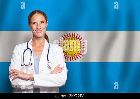 Medico curante generale argentino sulla bandiera dell'Argentina Foto Stock