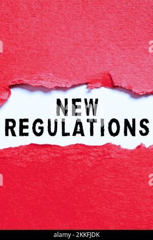 Scrittura a mano nuovo regolamento. Concetto che significa regole fatte da un governo o da un'autorità per controllare Foto Stock