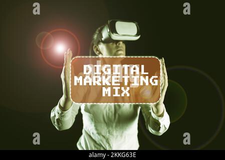 Testo scritto a mano Digital Marketing Mix. Concetto che significa insieme di azioni per promuovere il marchio nel mercato Foto Stock