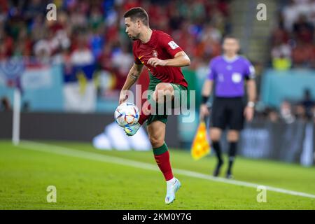 Doha, Qatar. 24th Nov 2022. Calcio: Coppa del mondo, Portogallo - Ghana, turno preliminare, Gruppo H, Giornata 1, Stadio 974, Raphael Guerreiro in azione in Portogallo. Credit: Tom Weller/dpa/Alamy Live News Foto Stock