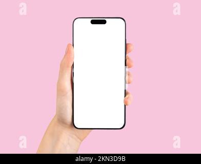 Telefono cellulare, smartphone mockup, schermo mock up in mano, POV su rosa. Foto di alta qualità Foto Stock