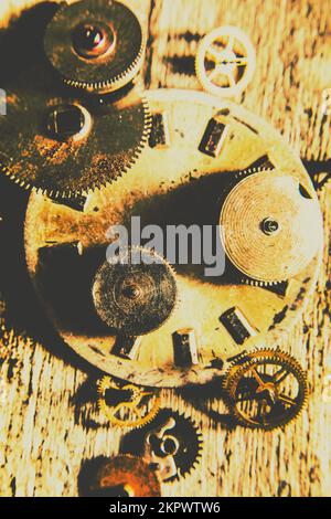 Foto di stile antico e di vita su complessi ingranaggi meccanici all'interno di un orologio in ottone arrugginito. L'uomo ha fatto il tempo Foto Stock